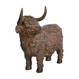 Libra Interiors rustic textured Highland cow sculpture in rust-brown resin with sweeping horns and shaggy carved coat, shown on a white background.