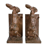 Libra Interiors Rustic Weathered Standing Hare Bookends in brown resin, shown as a facing pair of reared hares with backing plates on a white background.