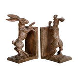 Libra Interiors Rustic Weathered Standing Hare Bookends in brown resin, a facing pair of rearing hares with sculpted fur detail on flat bases.