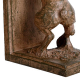 Close-up of Libra Interiors Rustic Weathered Standing Hare Bookend in brown resin, showing hind legs, paws and textured base against the flat backing plate.