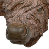 Close-up of the Libra Interiors Rustic Highland Cow resin wall art in brown, showing the textured shaggy coat and weathered muzzle detail.
