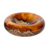 Libra Interiors Reactive Glaze Rounded Stoneware Bowl in brown with caramel, ochre and mocha drip tones and a high shine finish, on a white background.