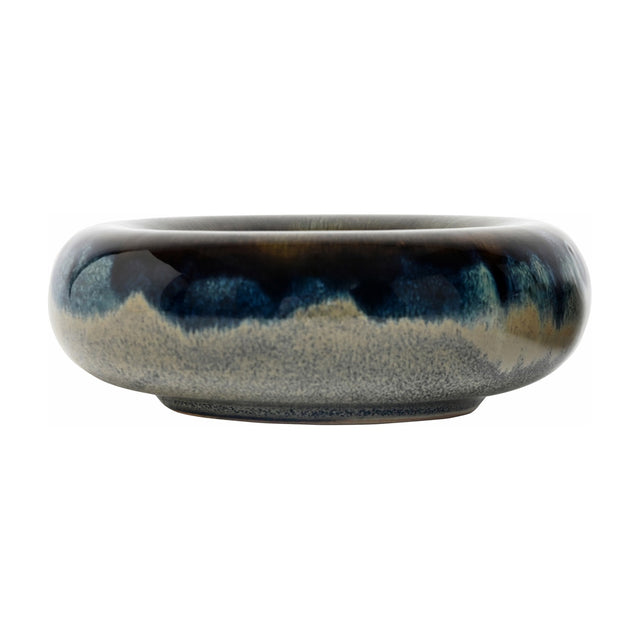 Libra Interiors Reactive Glaze Stoneware Bowl in blue, a low rounded ceramic bowl with inky blue and mottled grey glaze, on a white background.