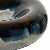 Close-up of Libra Interiors Reactive Glaze Stoneware Bowl in blue, showing the rounded sculptural profile and pooled inky blue and smoky grey glaze.
