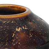 Close-up of the Libra Interiors Reactive Glaze Gourd Stoneware Vase in brown, showing the glossy speckled glaze with gold flecks around the short open neck.