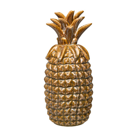 Libra Interiors glazed ceramic pineapple sculpture in warm brown and gold reactive glaze with a crosshatched textured body and spiky crown.