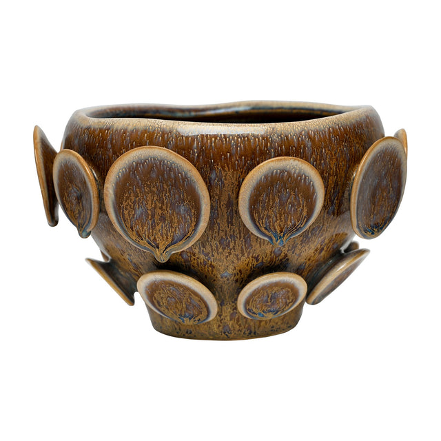 Libra Interiors Reactive Glaze Raised Circle stoneware planter in mottled brown, wide rounded form with sculptural raised discs, shown on a white background.