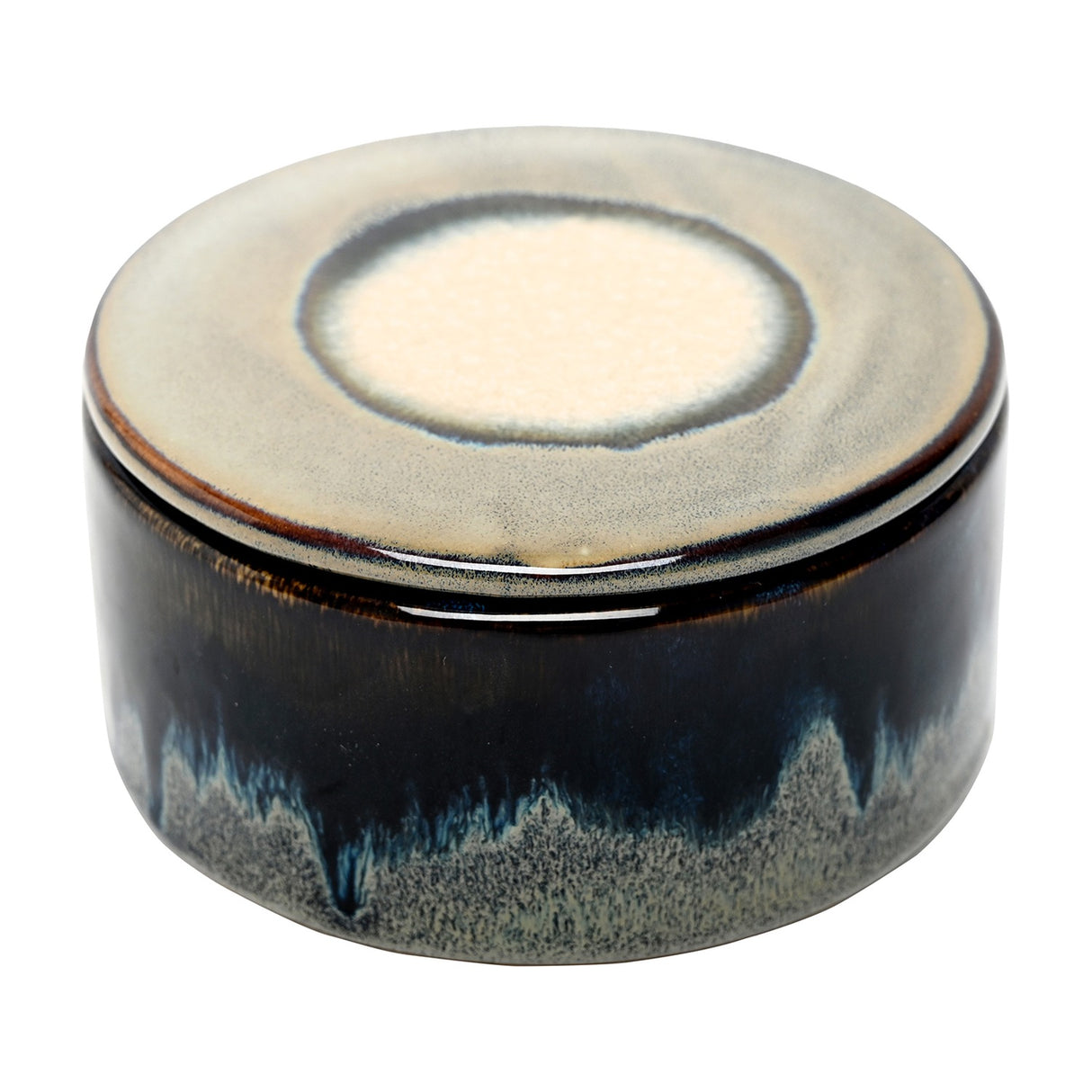 Libra Interiors Reactive Glaze Ceramic Rose Candle in blue, round lidded stoneware pot with inky blue body and cream-toned lid centre, on white.
