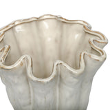 Close-up of the Libra Interiors Ruffled Ceramic Wavy Vase in cream, showing the glossy reactive glaze and golden-brown speckled tones along the wavy rim.