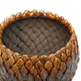 Close-up of the Libra Interiors Scale-Textured Ceramic Planter in brown, showing the glossy amber rim, scale-patterned exterior and fully glazed grey interior.