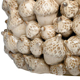 Close-up of Libra Interiors Textured Acorn Ceramic Planter in cream, showing clustered acorn forms with cross-hatched caps and smooth rounded bodies.