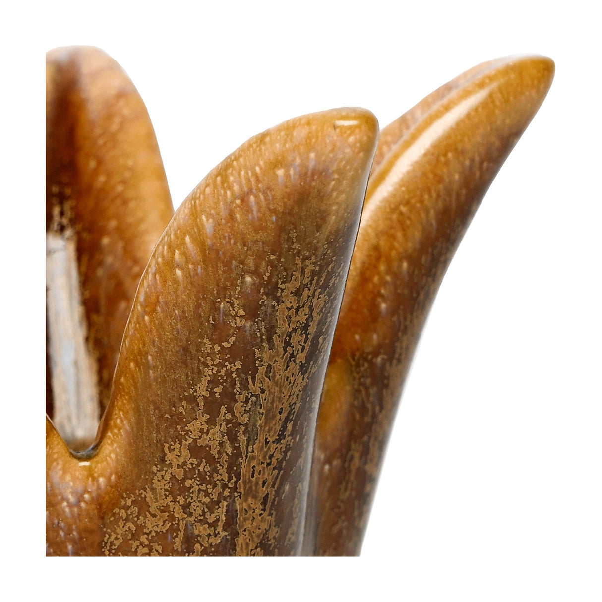 Libra Interiors Petal Reactive Glaze ceramic candle holder in brown with speckled amber tones and glossy ridged petal tips on a white background.