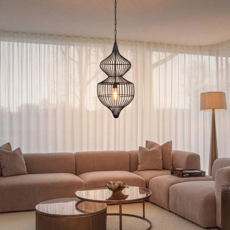 Libra Interiors Wire Cage Double Tiered Pendant Light in black steel with hourglass tiers, hung above a beige sofa and round coffee tables in a living room.