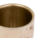 Close-up of the Libra Interiors Burl Veneer Brass-Lined Wine Rack showing the burnished brass steel interior and natural burl wood rim.
