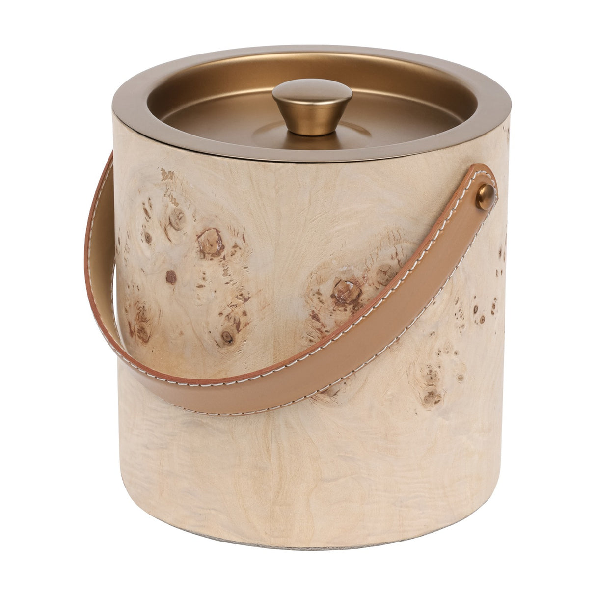 Libra Interiors burlwood veneer ice bucket with burnished brass lid, shaped knob and tan leather arched handle on a plain background.