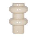 Libra Interiors Tiered Enamel Iron Vase in cream with stacked rounded tiers and a narrow cylindrical base, glossy finish, on a plain white background.