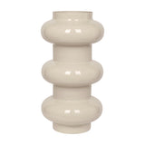 Libra Interiors Tiered Enamel Iron Vase in cream, with a stacked rounded silhouette and glossy finish, shown on a plain white background.