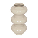 Libra Interiors Tiered Enamel Iron Vase in cream with three stacked rounded forms and a glossy finish, shown on a plain white background.