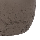 Close-up of the Libra Interiors Textured Two-Tone Iron Handled Vase in brown, showing the rough, burnished lower body meeting the smooth matt upper.