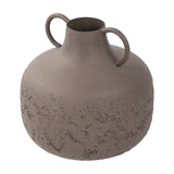 Libra Interiors brown two-tone metal vase with rounded bellied body, two looped handles, and textured base on a white background.