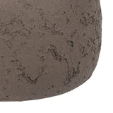 Close-up of the textured, burnished lower half of the Libra Interiors Textured Two-Tone Handled Metal Vase in warm earthy brown.