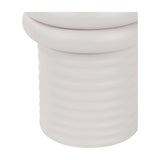 Close-up of the Libra Interiors Ribbed Iron Sculptural Side Table in cream, showing the ribbed cylindrical base and rounded domed top in matte finish.
