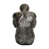 Rear view of Libra Interiors Textured Resin Seated Male Sculpture in antique gold, showing the curved spine and hunched shoulders against a white background.