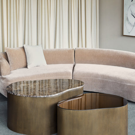Libra Interiors Marble & Glass nesting coffee tables with organic shapes, brown Emperador marble and tinted glass tops on burnished gold corrugated bases.