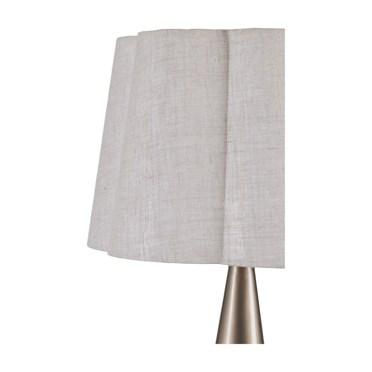 Close-up of the Libra Interiors Tapered Iron table lamp showing the scalloped natural linen shade and smoked gold cone-shaped base.