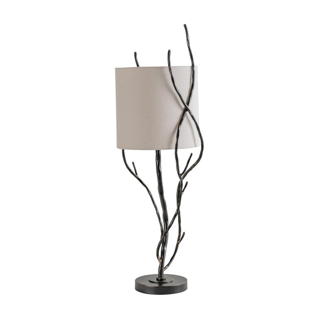 Libra Interiors Branch Iron Twig table lamp in black with hand-forged twisting stems, round weighted base and cylindrical linen shade on a white background.
