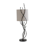 Libra Interiors Branch Iron Twig table lamp in black with hand-forged twisting branch-like stems, round base and cylindrical linen shade, on a white background.