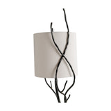 Libra Interiors Branch Iron Twig table lamp in black with hand-forged twisting stems and a cylindrical linen shade, shown on a white background.