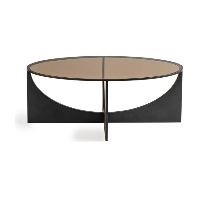 Libra Interiors Bronze Glass Sculptural Coffee Table in black, with an oval smoked glass top on intersecting curved iron panels, on a white background.