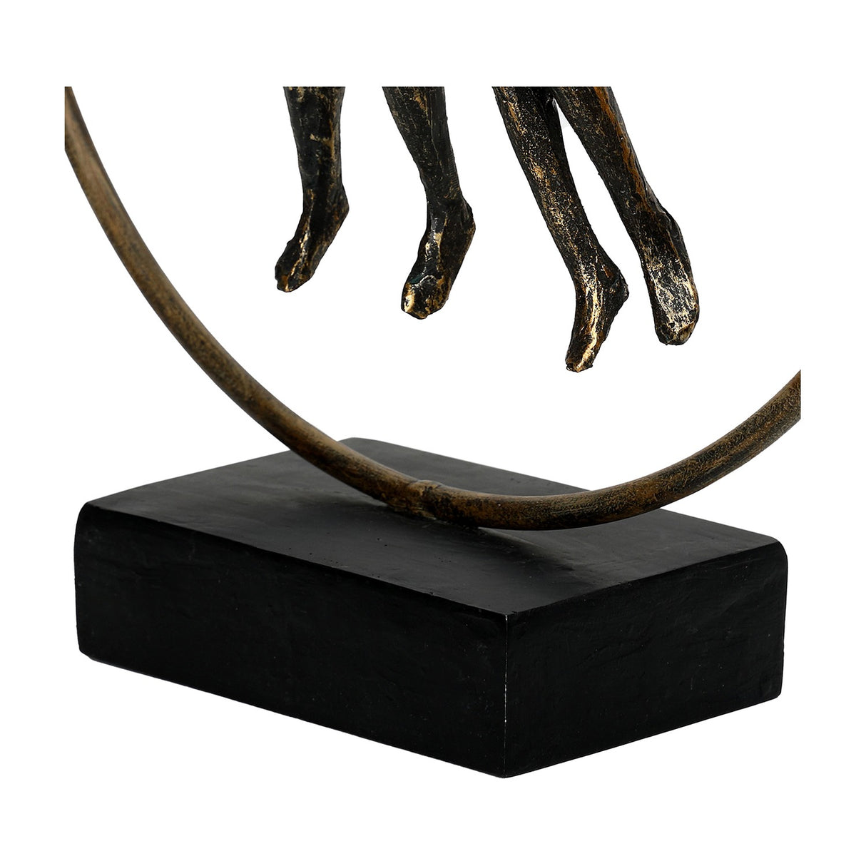 Close-up of Libra Interiors Antique Gold Circle Seated Couple Sculpture base, showing the figures' slender legs, brushed metallic ring and solid black plinth.