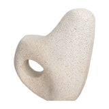Libra Interiors Grainy Abstract Stacked Organic Sculpture in white resin, close-up of the curved biomorphic form with an open cut-out and sandy matt texture.