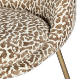 Close-up of the Libra Interiors Woven Animal Print dining chair, showing taupe and ivory jacquard upholstery on the curved seat with a slim brass leg.