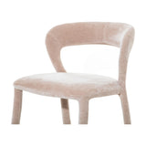 Close-up of Libra Interiors Velvet Wrapped Curved Back Bar Stool in taupe, showing the sculptural curved back and rounded seat in brushed velvet.