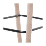 Close-up of Libra Interiors Velvet Wrapped Curved Back Bar Stool in taupe, showing fabric-covered legs meeting the black powder coated metal footrest.