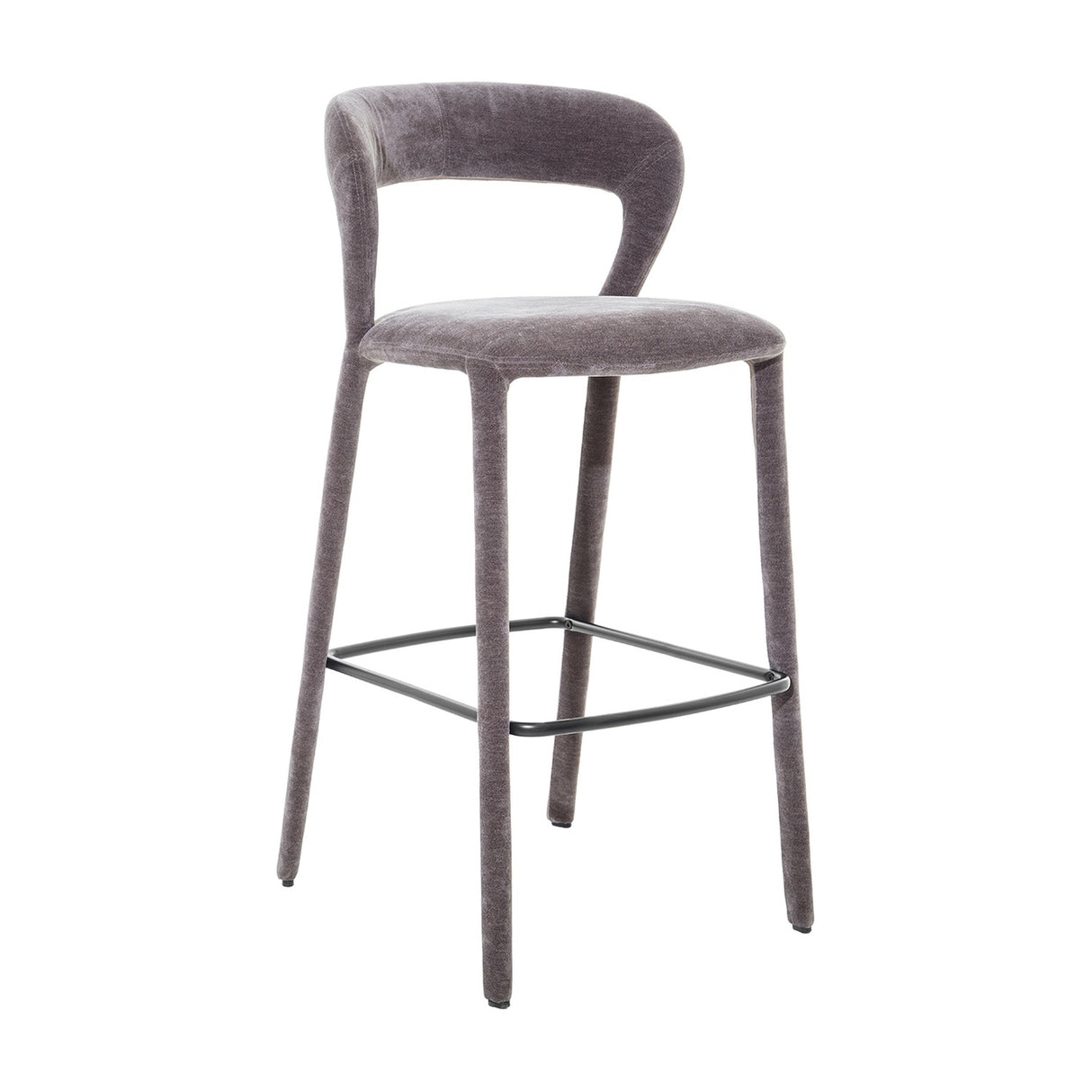 Libra Interiors Velvet Curved-Back Bar Stool in grey with padded seat, low curved backrest, upholstered legs and black powder-coated steel footrest.