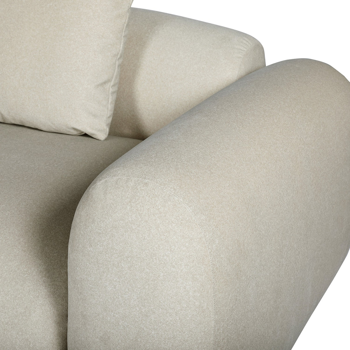 Close-up of the Libra Interiors Brushed Velvet 3 Seater Modular Sofa in cream, showing the rounded arm, brushed felted upholstery and matching cushion.
