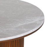 Close-up of Libra Interiors Marble Top Fluted Walnut Round Coffee Table showing the pebble grey marble surface and walnut-finished fluted rim.