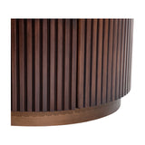 Close-up of Libra Interiors Fluted Walnut Chest of Drawers with curved rubberwood base, deep vertical fluting and matching plinth in walnut finish.