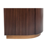 Close-up of the Libra Interiors fluted walnut pedestal base with antique brass-toned plinth trim on a plain white background.