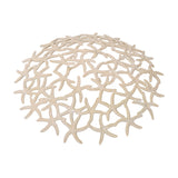 Libra Interiors Starfish Openwork Shallow Bowl in beige cast aluminium, shown from above with interlocking starfish lattice on a white background.