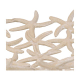 Close-up of the Libra Interiors Starfish Openwork Shallow Bowl in beige, showing the cast aluminium interlocking starfish lattice with matt stonewash texture.