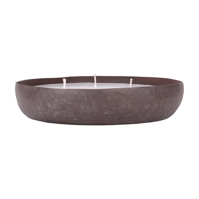 Libra Interiors hammered aluminium three-wick bowl candle in brown with white wax and cotton wicks, shown on a plain white background.