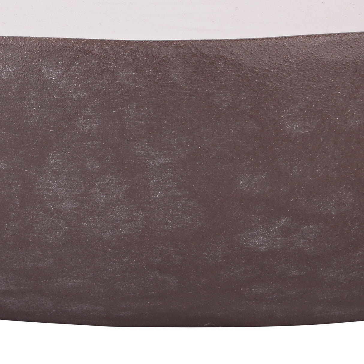 Libra Interiors hammered aluminium three wick bowl candle in brown, close-up detail of the matte stonewash finish and rounded vessel side.