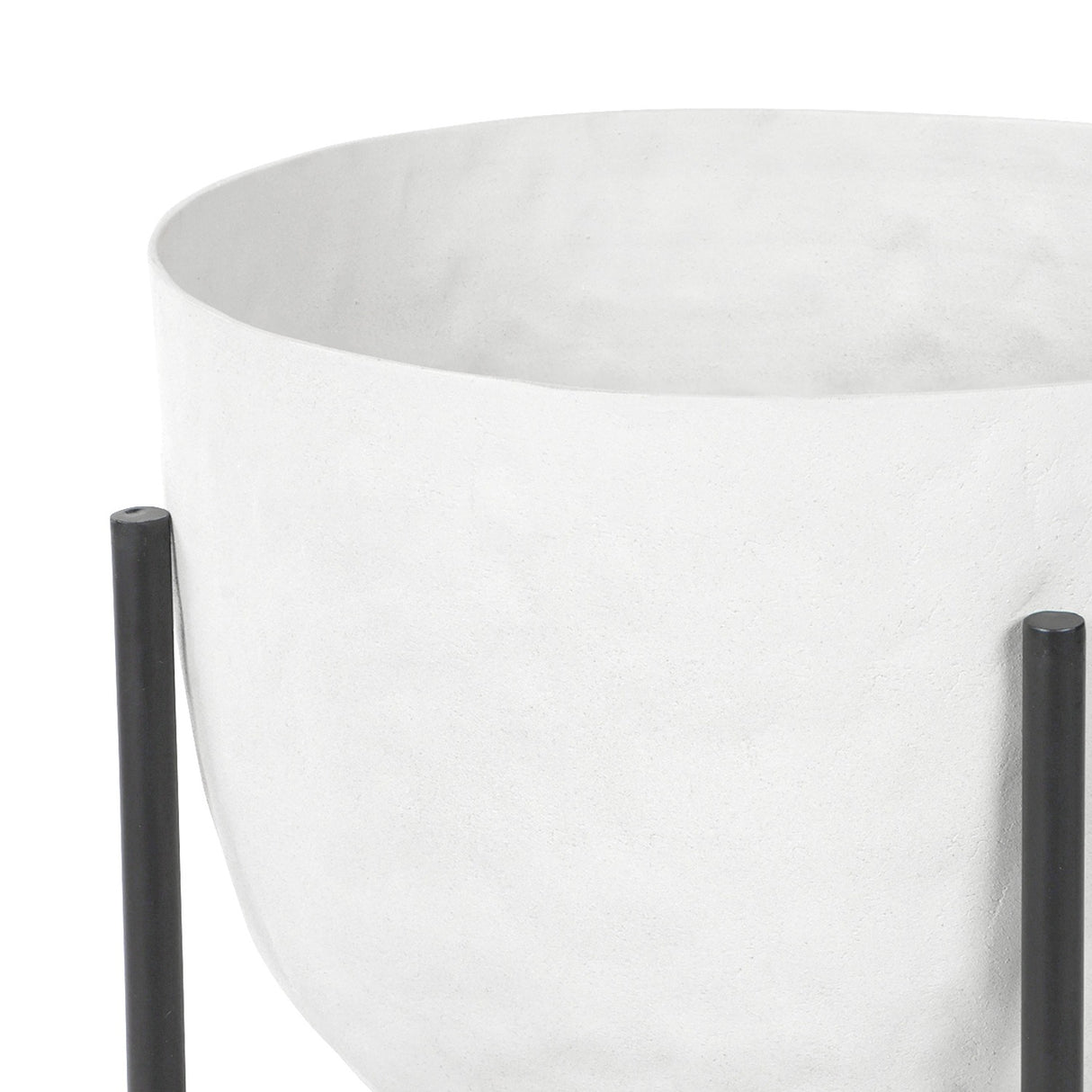 Close-up of the Libra Interiors Hammered White Aluminium Planter, showing the matt white bowl and slim black iron-look legs.
