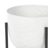 Close-up of the Libra Interiors Hammered White Aluminium Planter, showing the matt white bowl and slim black iron-look legs.