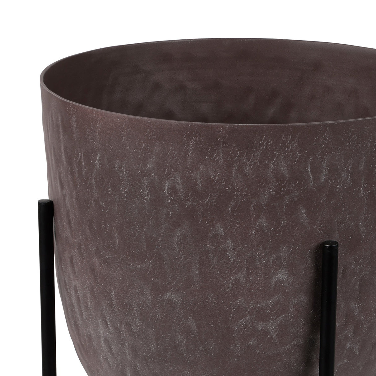 Libra Interiors Hammered Aluminium Raised Planter in brown with textured stonewash bowl and black iron stand legs on a white background.